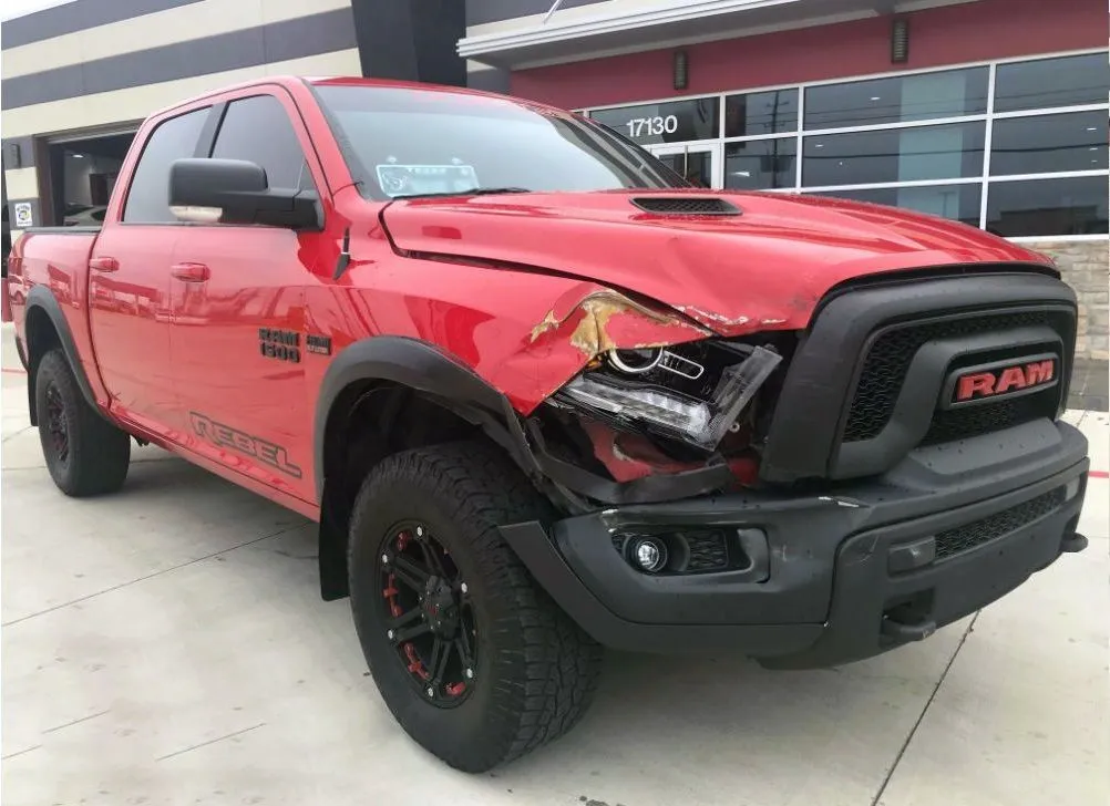 Collision repair result — RAM Raptor — Before